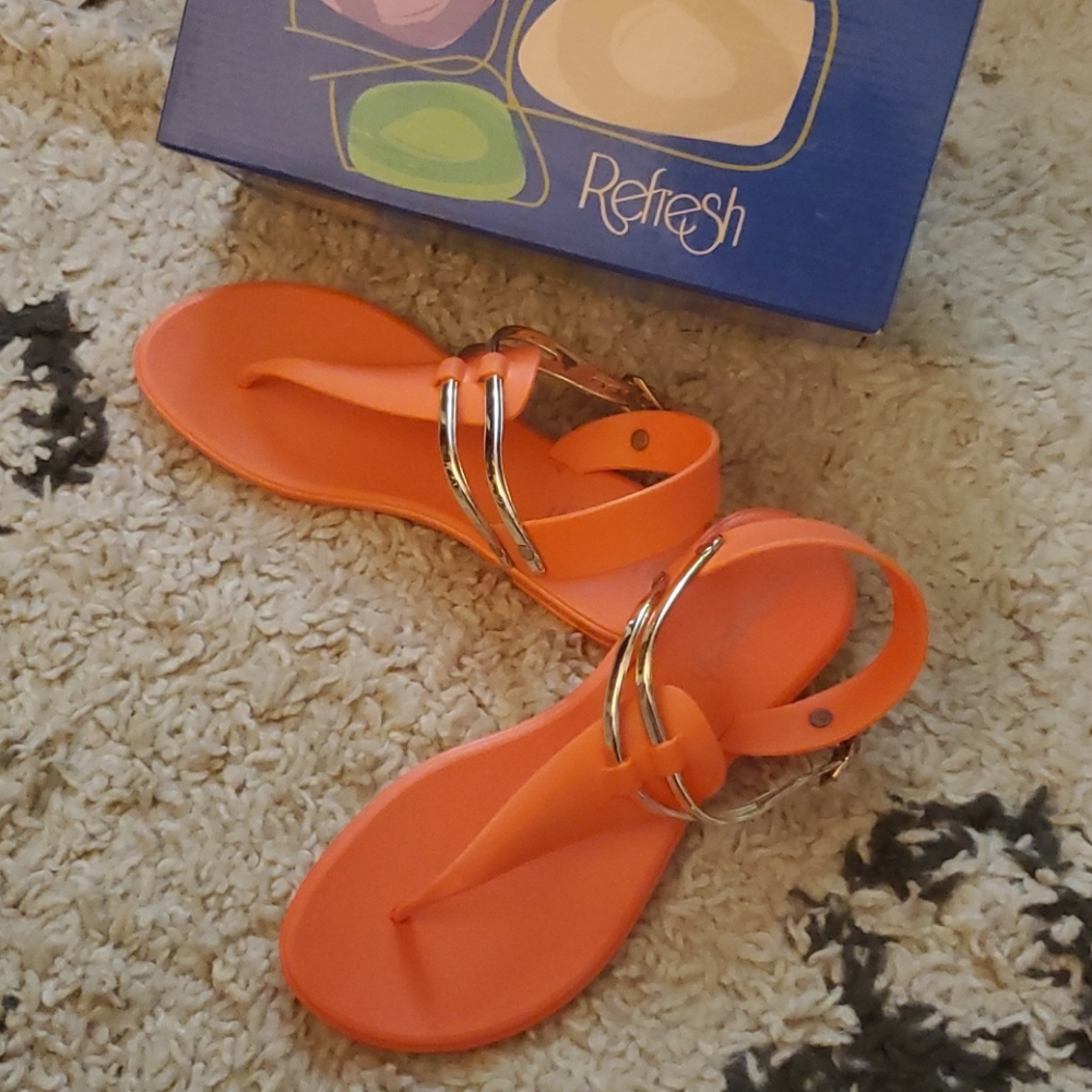 HUGH SALE ON THESE coral shoes size 7.5